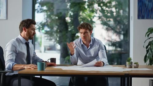Business People Discussing Documents at Office Closeup Colleagues Speaking