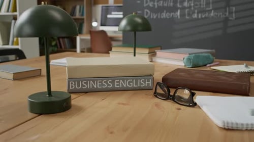 Business English Textbook Lying on Desk for Migrant Students