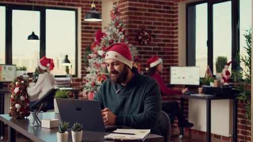 Festive Office Team in Santa Hats Video Call