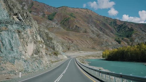 Road Through Mountains Moving Tracking Shot Highway Passes Through Hills Rivers Natural Scenery