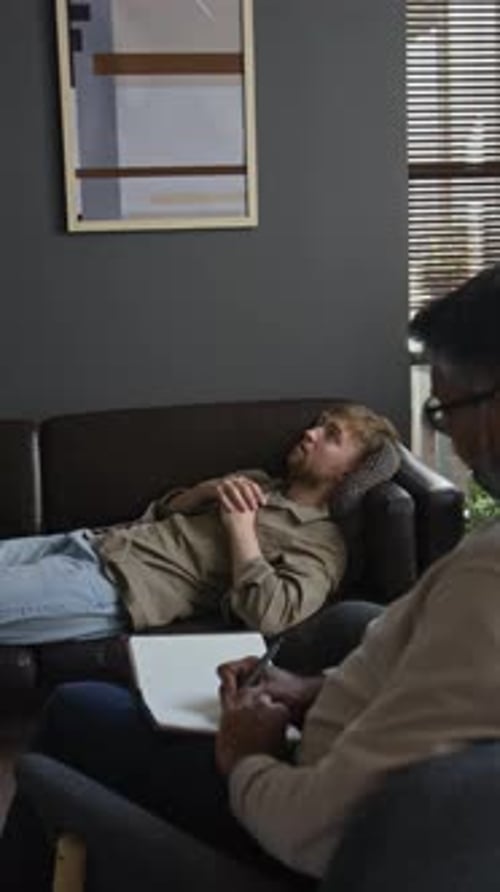 Man Lying on Couch in Therapy