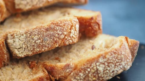 Toast bread slices on the black cutting board