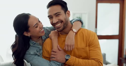 Couple, hug in portrait and relax in lounge with love, bonding and happy people together at home