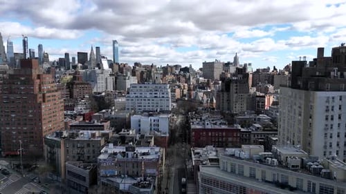 New York City skyline captured with vibrant urban architecture and dramatic skies. A stunning aerial