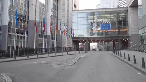 European Parliament Building with National Flags in Brussels