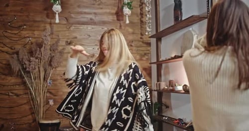 Young Men and Women Dance Enjoying Dynamic Music in Cafe