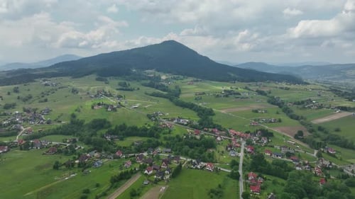 Aerial panorama of Kasina Wielka village in Beskid Wyspowy mountains in Southern Poland