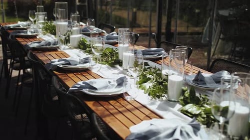 Bride and Groom Place Settings at Wedding Reception Table Beautiful Plates with a Gold Border on a