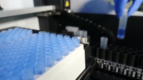 Close Up of Robotic Machine Performing Science Experiments