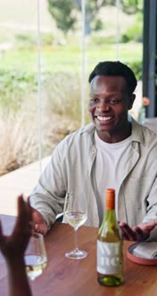 Cheers, friends and man in restaurant with wine for social gathering, reunion and tasting event