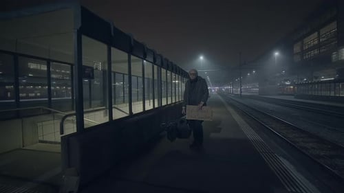 Elderly Homeless Man Suffering From Poverty Looking for Help at Train Station