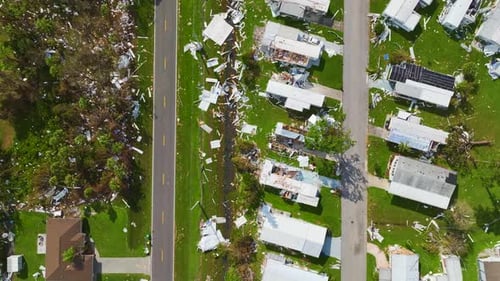 Severely Damaged Houses After Hurricane Ian in Florida Mobile Home Residential Area Consequences of