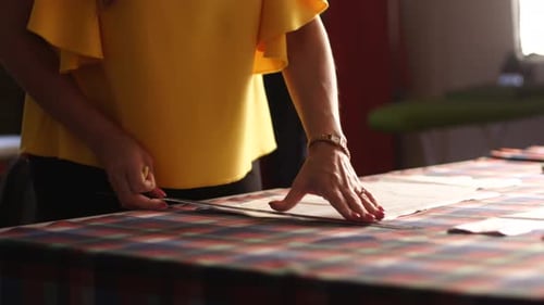 Fashion Designer Woman Working in Studio Caucasian Female Tailor Drawing the Layout for Clothes on