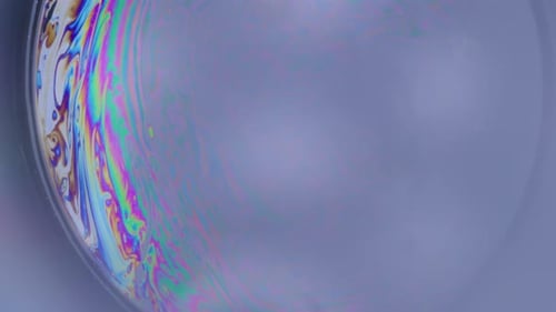 Macro Shot of a Colorful Iridescent Liquid Bubble