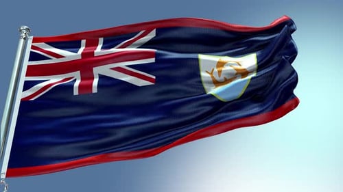 Anguilla Flag Waving on a Pole Against Blue Sky