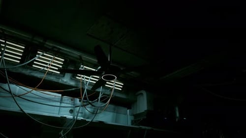 Rotating Industrial Ceiling Fan in Dark Sci-Fi Setting