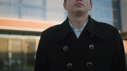 Young Adult Wearing a Coat in the City