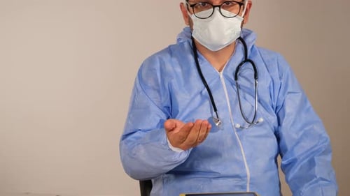 Doctor Reveals Medication in Hand