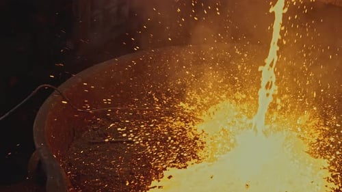 Molten Metal Pouring into Container