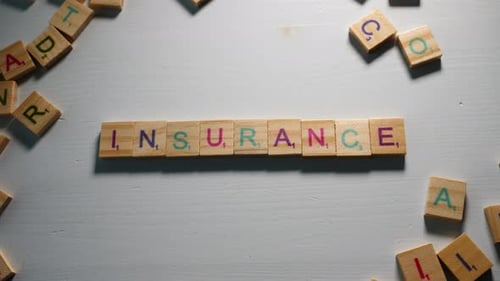 Insurance Spelled with Colorful Block Letters