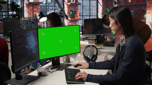 Startup IT Expert Uses AI to Streamline Coding Process on Green Screen PC