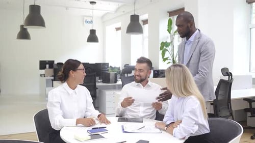 Multiethnic Business People During Meeting in Modern Office