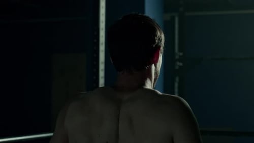 Man Doing Upward Shoulder Blade Rotations at Gym