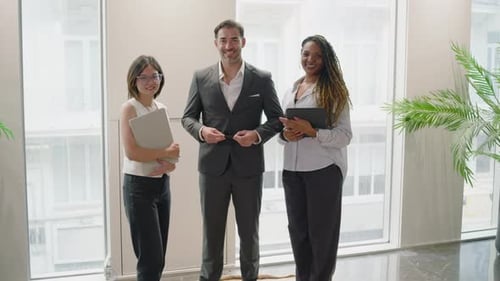 A Diverse and Inclusive Business Team Collaborating in a Modern Office Environment