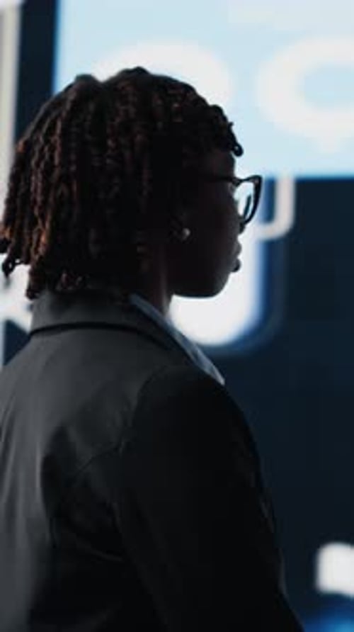 Vertical Video Business Expert Wearing Suit Reviewing Performance Dashboards Metrics
