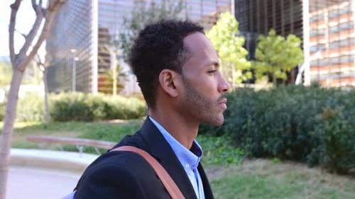 Young African American Business Man Walking in the City