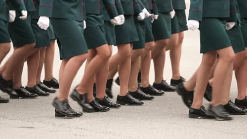 Synchronized Marching of Women in Uniforms