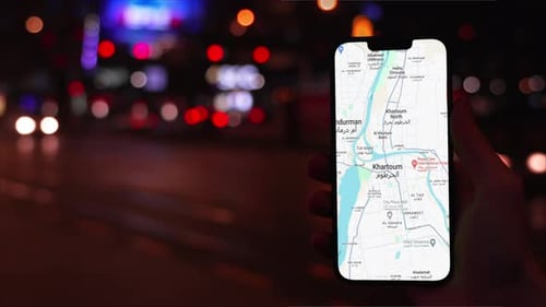 Smartphone Displaying Khartoum City Map at Night