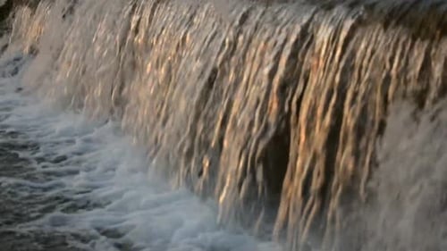Catching a waterfall in a small freshwater channel.
