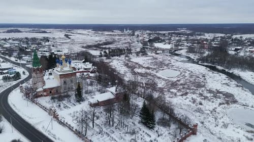 Camera Pans Over a SnowCovered Village