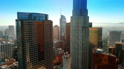 Flight among the diverse buildings of skyscrapers in the city center of Los Angeles, California, USA