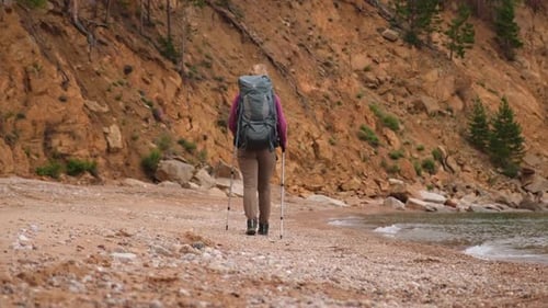Hiking Tourism Adventure Unrecognizable Hiker Girl Tourist with Backpack Walking Near Lake