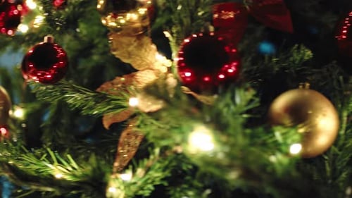 Toy Nutcracker Near the Christmas Tree