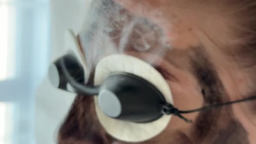 Young Woman Getting Carbon Laser Facial at Beauty Clinic Professional Skincare Treatment for Deep