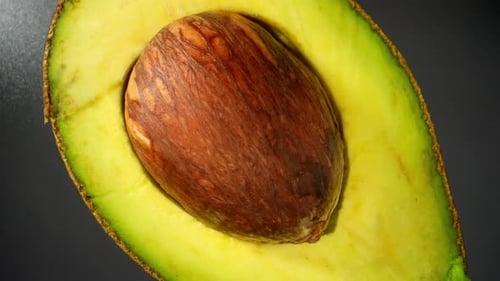 Half avocado macro video. 4K