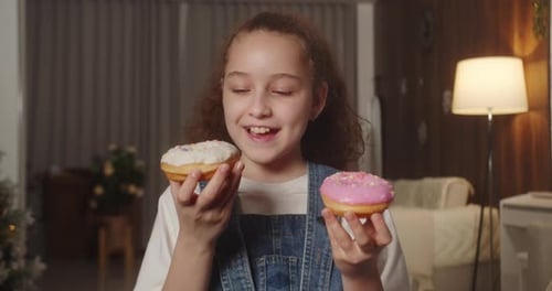 Portrait of a Happy 11 Year Old Child Who Can't Decide Whether to Eat a Delicious Sweet Dessert