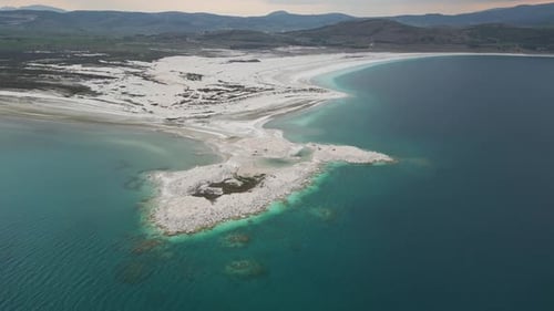 Curved Aerial View Above Headland at Lake Salda in Turkey