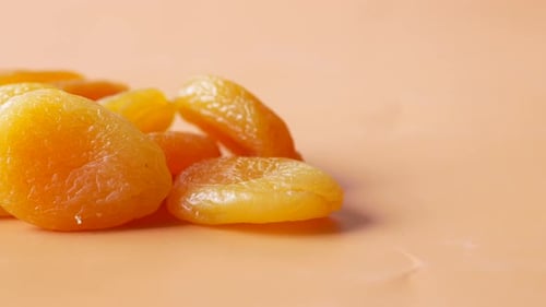Apricot Fruit Half on Wooden Board on Table