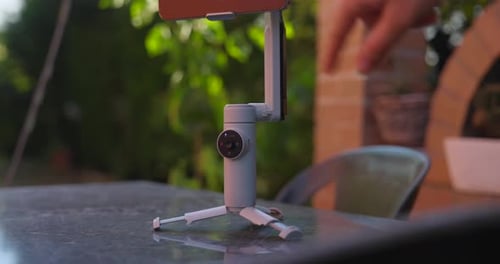 Smartphone Gimbal Stabilizer Rotating on Table