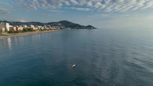 Sea Man Sup Top Down View on Athlete Man Swimming in Sea and Paddleboarding at Summer Sunset