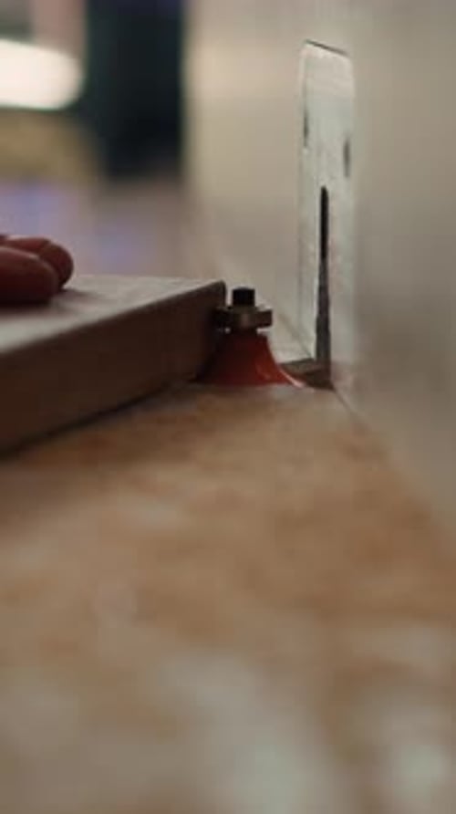 Vertical Video Cabinetmaker in Joinery Using Heavy Machinery Close Up