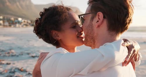 Kiss, travel and couple on vacation, beach and romance for valentines day on trip