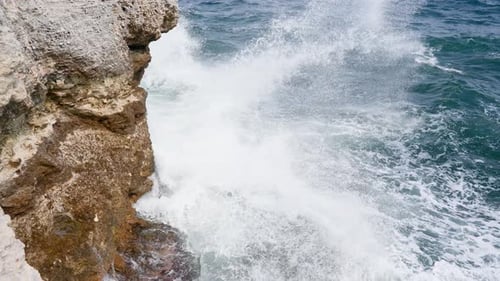 Sea Waves Wash Over the Rocks Storm and Bad Weather at Sea in Super Slow Motion