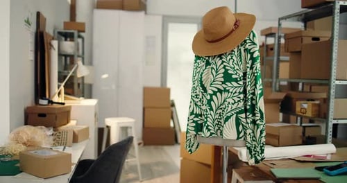 Fashion, workshop and clothes with boxes for supply chain, shipping and delivery for boutique