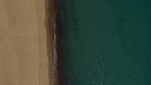 Nature Background. Aerial View Sand Beach Ocean Surface in Warm Summer Morning