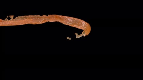 Liquid is Spinning Twist Splash on Black Back Super Slow Motion 1000 FPS